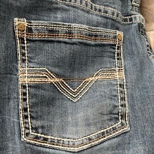 Classic Blue Denim Jeans with Detailed Stitching